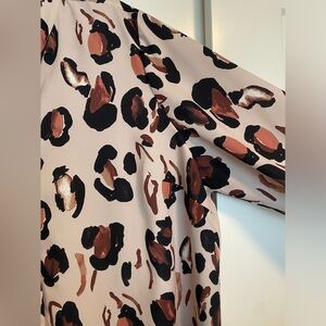 Cheetah Print Blouse with Detailed Neckline and Wrist